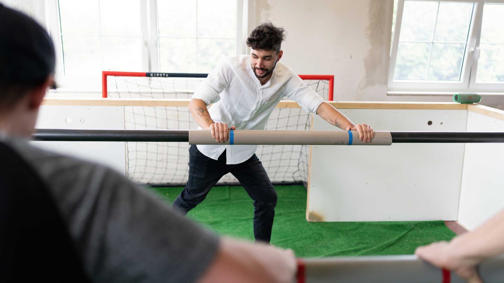 Lidský stolní fotbal